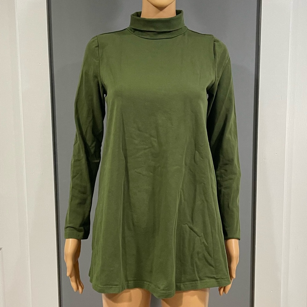 BY DESIGN Top